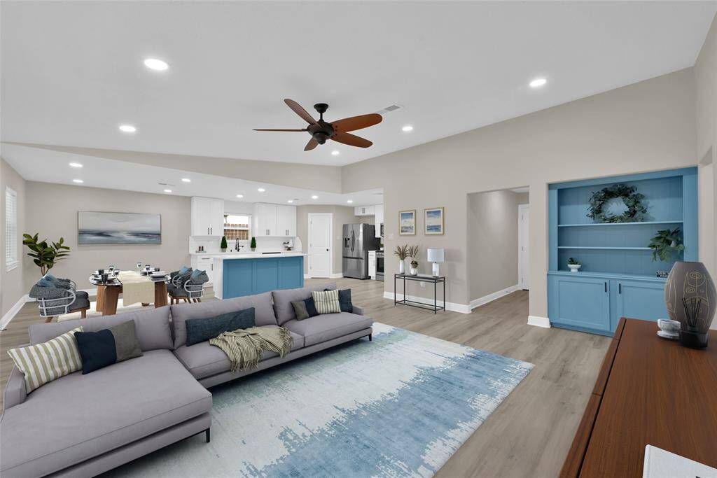 Entering the main living space you'll see that this home provides a modern and spacious open-concept home. The bright and airy living area has vaulted ceilings and large windows that allow ample natural light to permeate your living area.*Virtually Staged