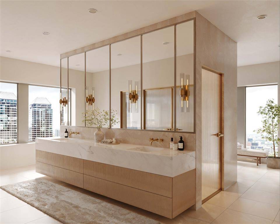 *PRIMARY BATHROOM VIRTUAL RENDERING* Indulge in this luxurious primary bathroom, featuring a spa-like soaking tub, a spacious glass-enclosed shower, and an expansive walk-in closet as envisioned by Kirkey Architecture on the 26th floor. Floor-to-ceiling windows offer stunning West-facing views over Tanglewood, providing the perfect backdrop for breathtaking sunsets. With endless customization options, this bathroom can be transformed into your ultimate sanctuary in the prestigious Belfiore penthouse.