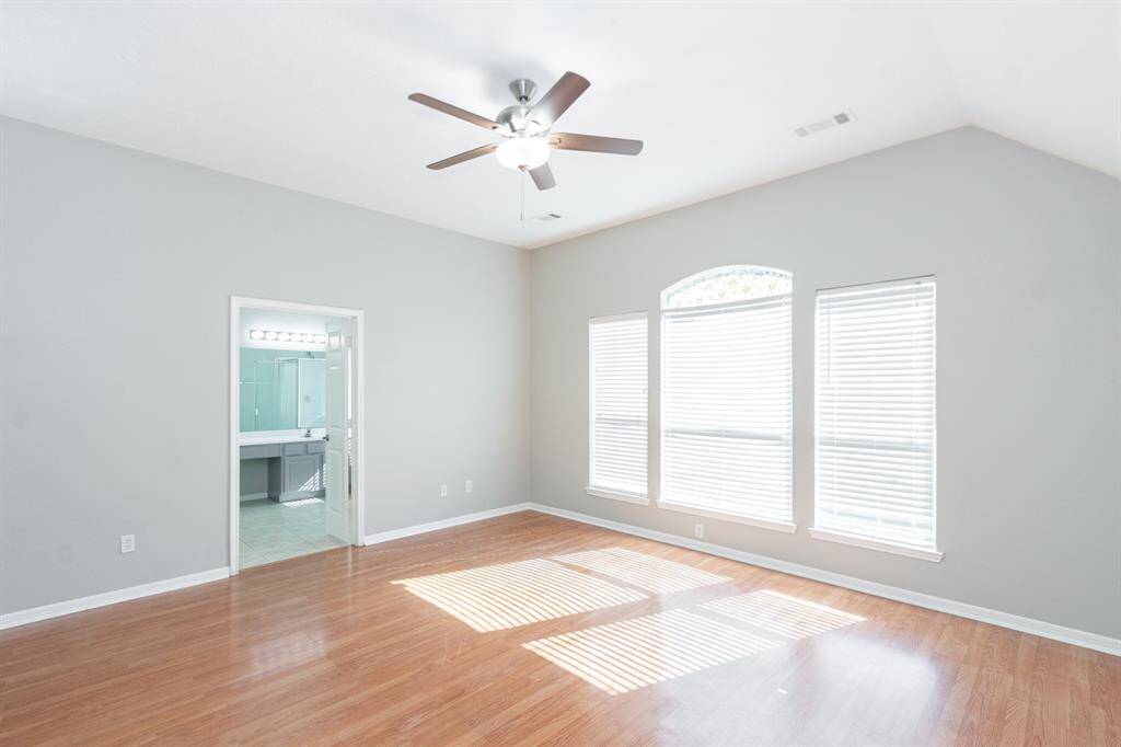 Huge primary bedroom with plenty of space to unwind