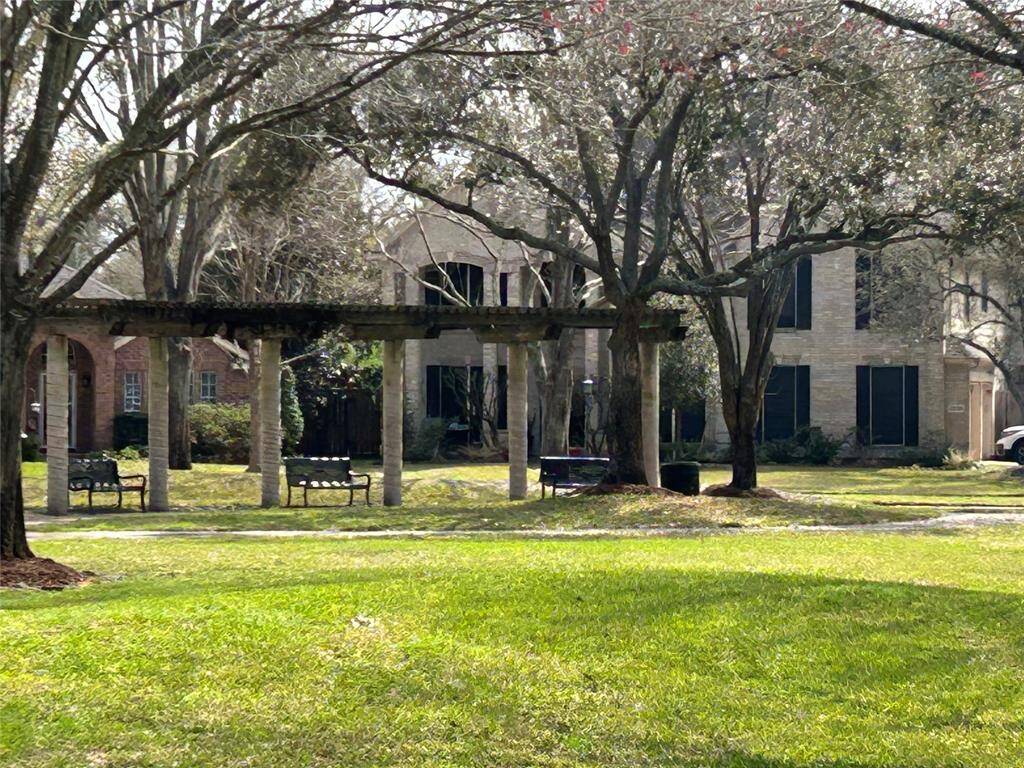 Your new subdivision also has a sitting area with lots of mature shade trees