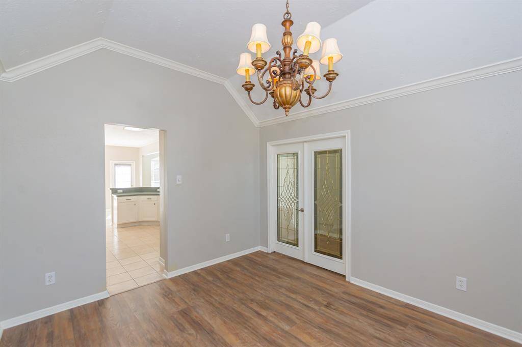 This formal/office sits right next to the kitchen for easy access