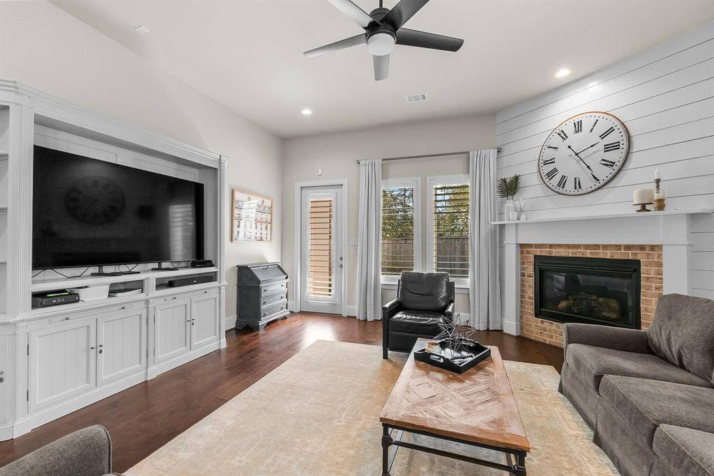 Living area boasts a built-in entertainment center for theater-like experience.