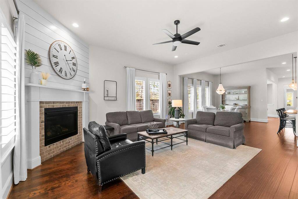 Open living/dining/kitchen design creates a seamless flow ideal for entertaining.