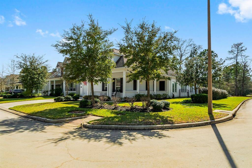 Located on a corner lot, the property offers ample natural light and a spacious yard.