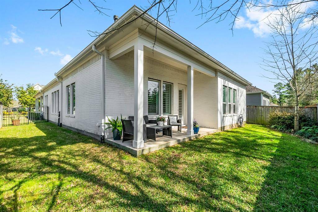 Lovely covered back patio, perfect for enjoying your morning coffee or unwinding in the evening. The backyard is fully fenced for privacy.