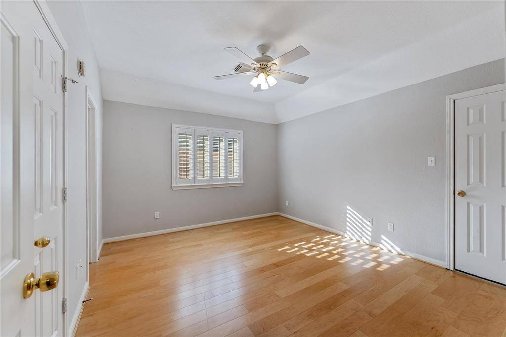 Upstairs bedroom #2 with large walk in closet and shared bathroom.