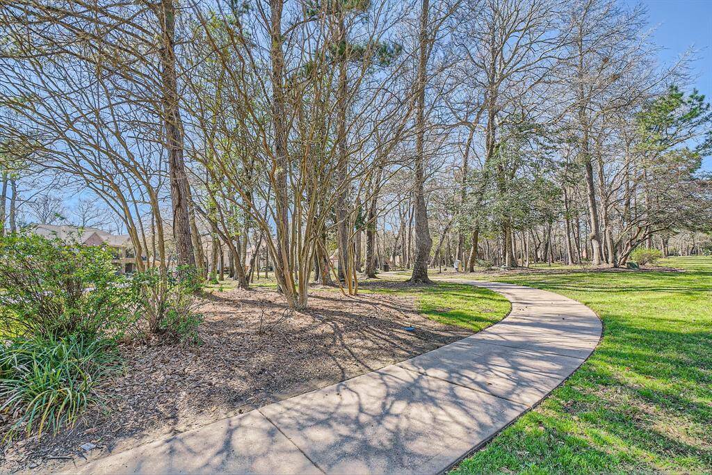 A beautiful serene park with a winding path and it is just a few steps away from the house.