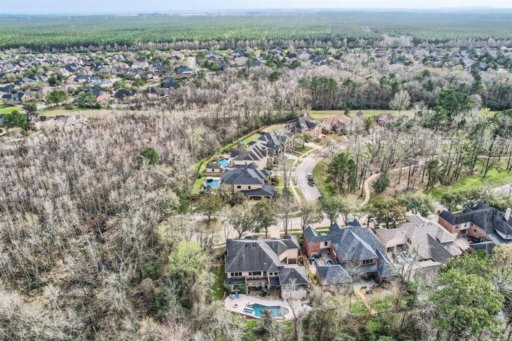Another great view of this beauty looking to the back of the home with the pool on a quiet cul de sac.