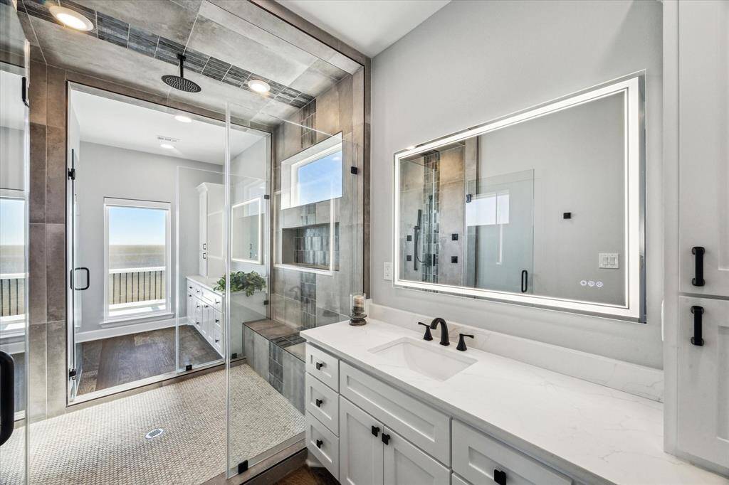 ONE OF THE TWO VANITIES THE OVERLOOKS THE BAY IN THE BACKGROUND.