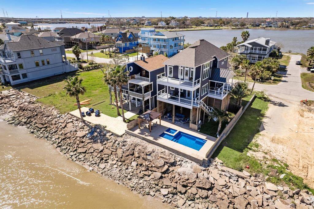 THIS AERIAL VIEW HIGHLIGHTS THE LOW MAINTENANCE RIP-RAP CONCRETE BULKHEAD.