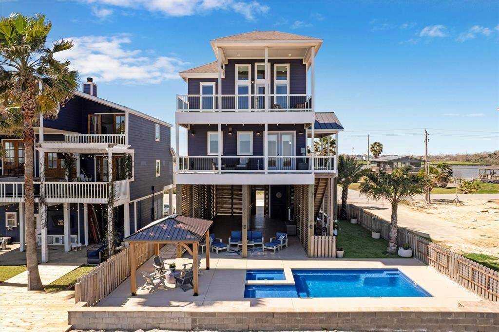 THIS IS WATERFRONT LIVING AT ITS' FINEST WITH ENDLESS BAY VIEWS, POOL, SPA, OUTDOOR FIREPLACE AND EXTENSIVE OUTDOOR ENTERTAINING.