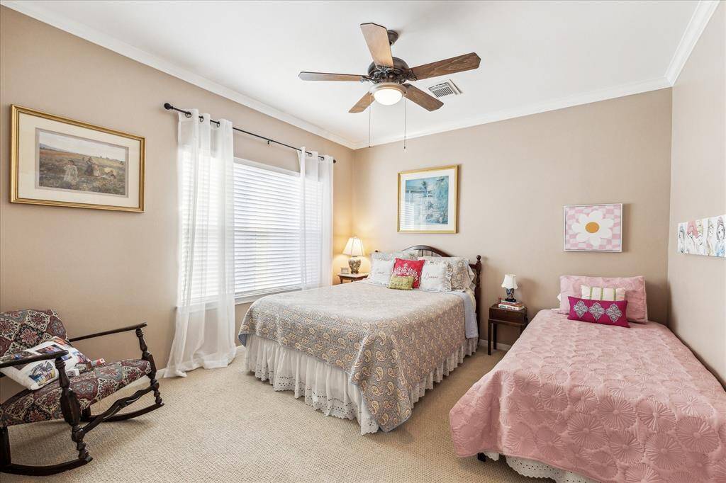 Another spacious secondary bedroom.