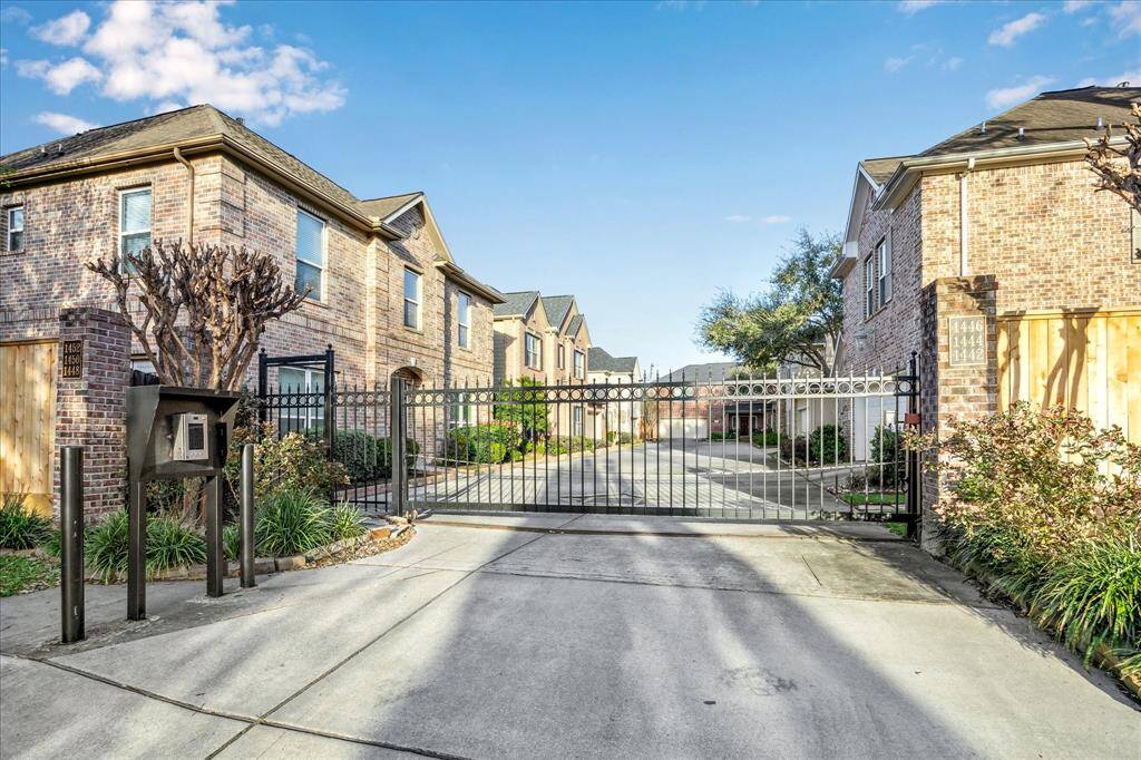 This charming light brick patio home resides within a gated community of just six residences, offering a rare blend of intimacy and modern elegance in Houston’s sought-after Spring Branch landscape.