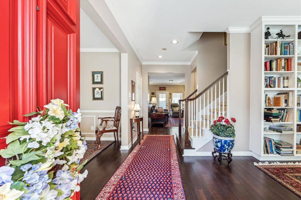 Step into this inviting home and be greeted by sleek laminate flooring that guides you into an open, airy layout.