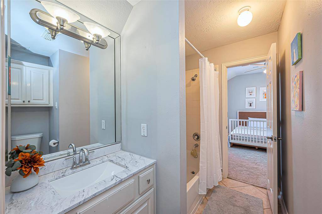 Convenient bathroom #4 connects the third and fourth bedrooms; also referred to as a Hollywood bathroom.