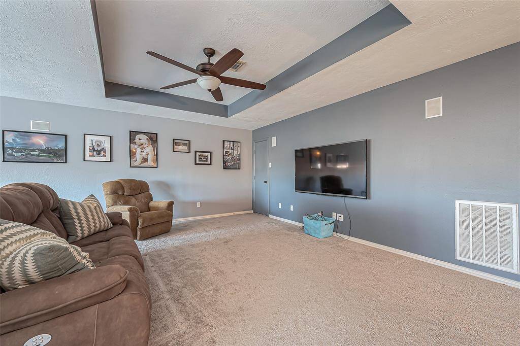 Expansive game room perfect for entertaining and relaxation.