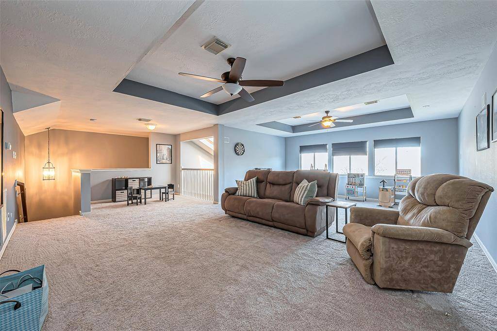 Alternative view of the oversized gameroom located upstairs.