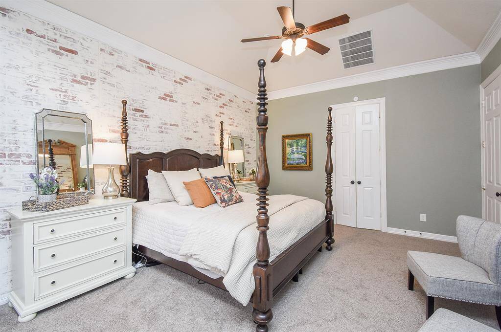 Expansive Primary suite with extended seating space.