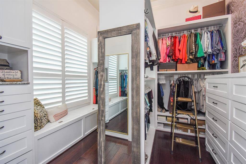 Massive closet with custom shelving and storage.