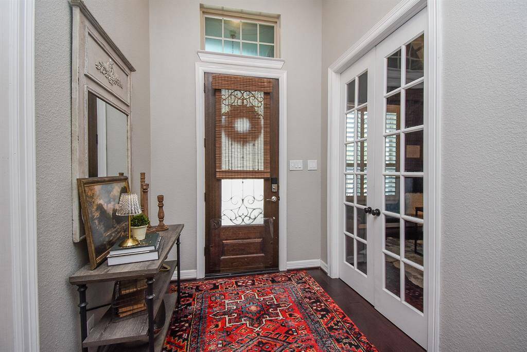 Front entry with the office behind the glass doors.