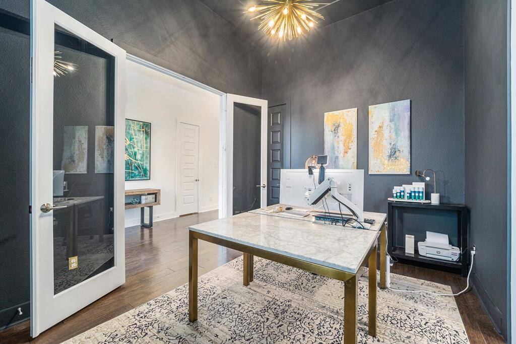 Office featuring color-drenched walls and custom lighting, providing the perfect setting for work-from-home productivity.