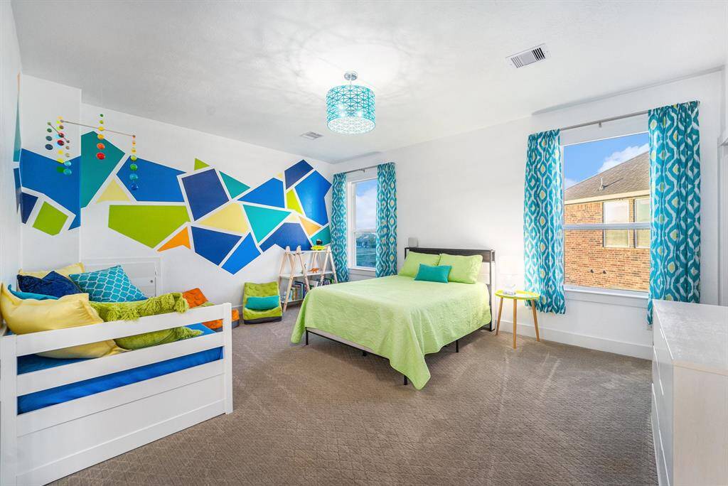 Both kids’ bedrooms are equipped with electric blackout curtains, oversized closets, and ample space for comfort and functionality.