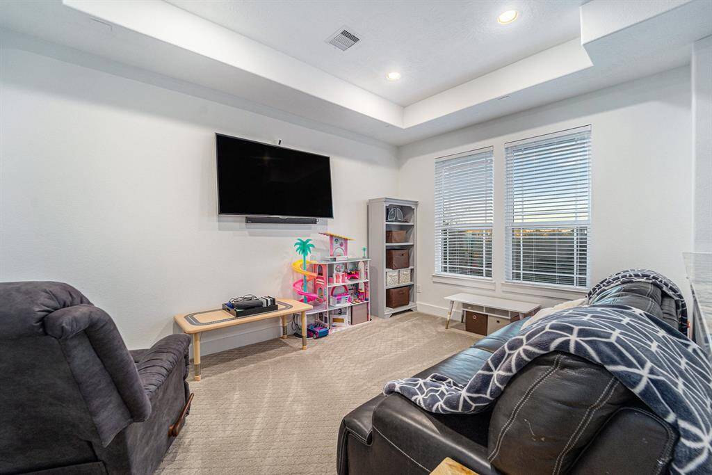 Media Room - Versatile media room, ideal for movies, gaming, or casual entertainment.
