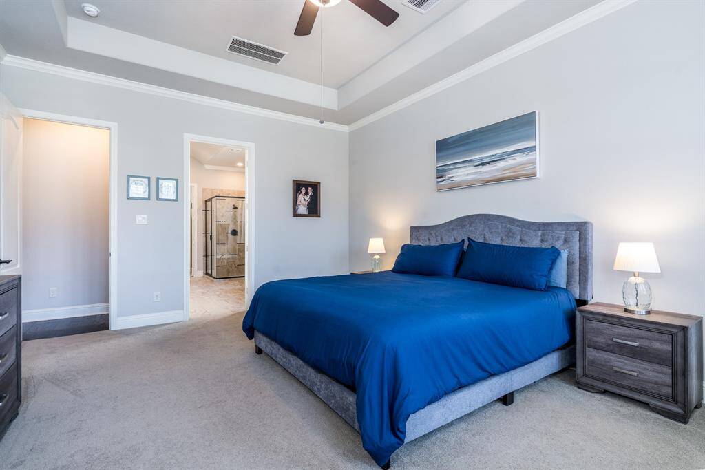 Neutral paint and soft carpet underfoot offer the perfect owner's retreat after a long day!