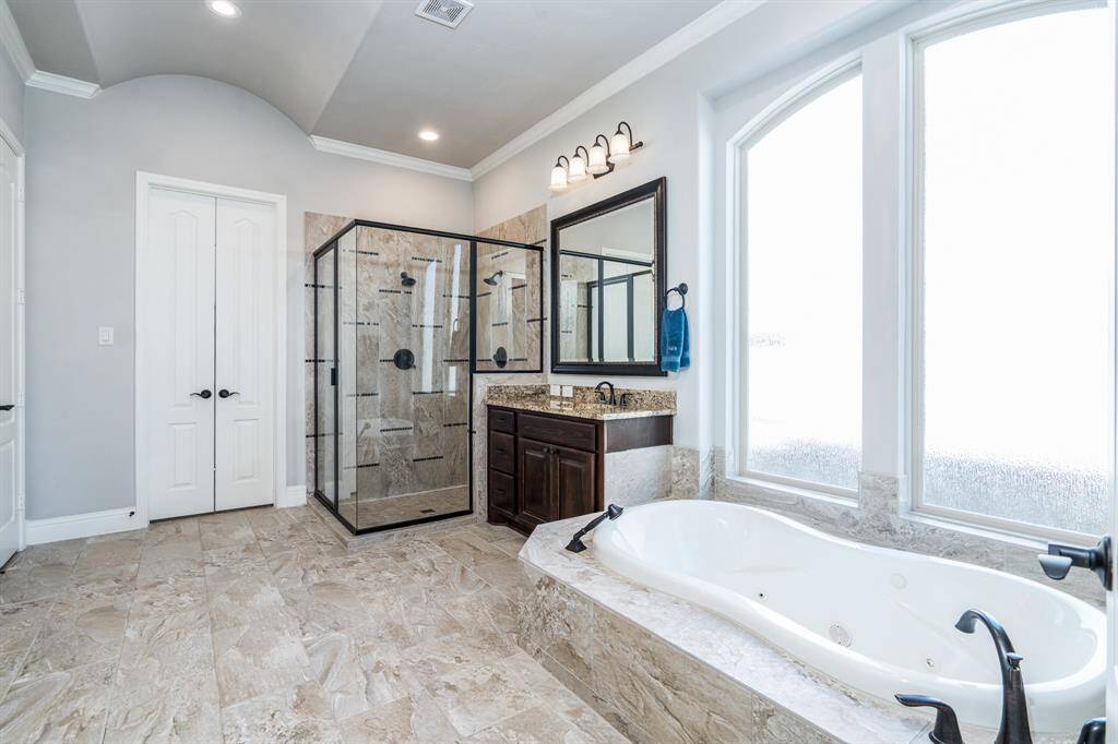No better place to start or end your day! Do you prefer bubbles or steam? A glass enclosed shower and soaker tub offers you the choice!