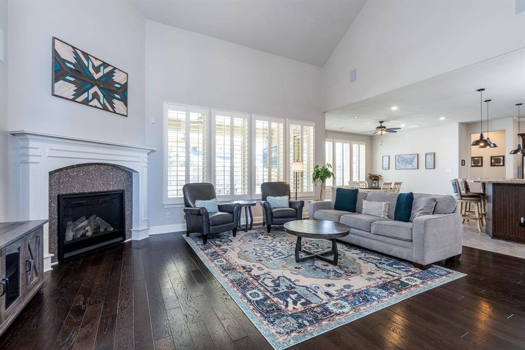 This expansive family room offers the ideal gathering space to warm up by the fire, take in a movie or entertain a crowd!