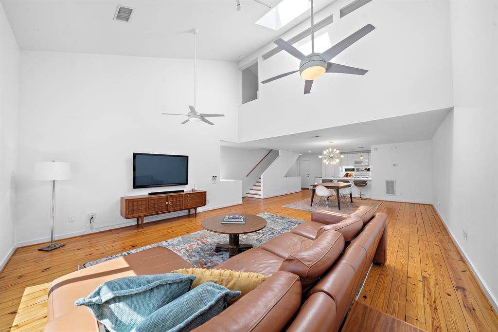 The vaulted ceiling makes this large space feel even larger, and a skylight just tops it off.