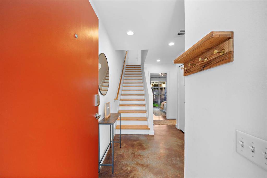 Enter the home to concrete flooring throughout the first floor.