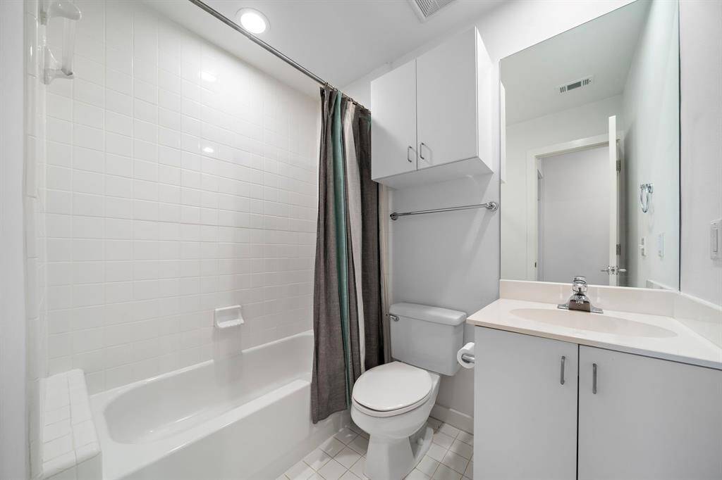 Full hall bath located conveniently between Bedrooms #1 and #2.