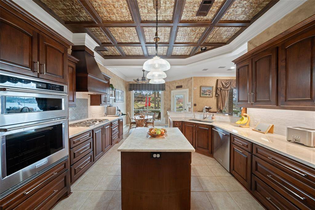 DESIGNER "TIN LOOK" CEILING ABOVE RECENTLY UPGRADED KITCHEN