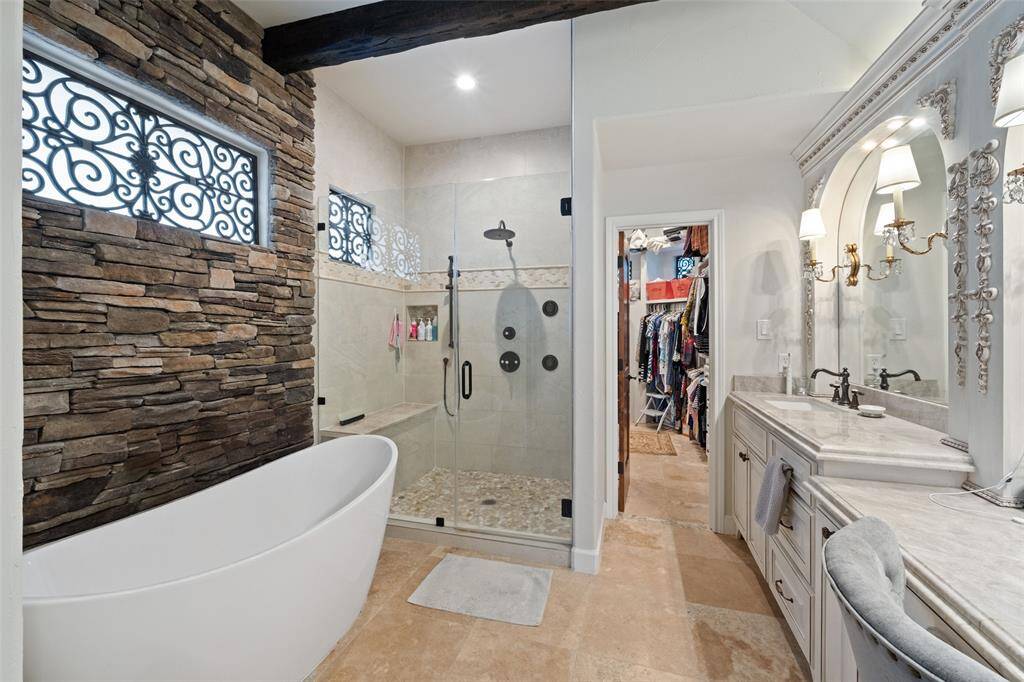 ROOMY SHOWER AND BATH IN LUXURIOUS SURROUNDINGS