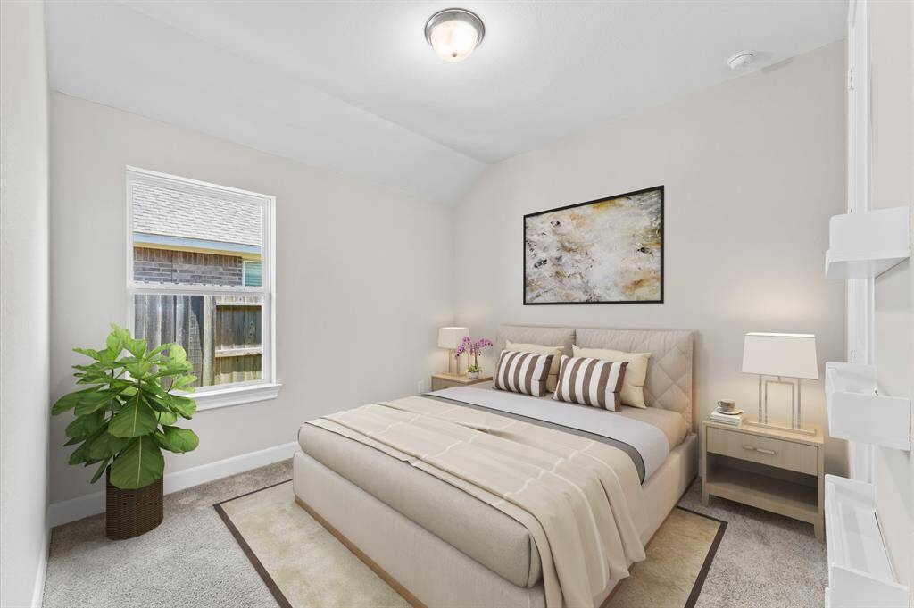 Cozy and welcoming, the second bedroom is a versatile space that can serve as a guest room, home office, or a tranquil retreat.