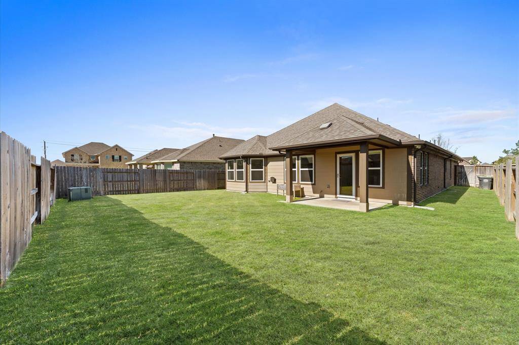 Step outside to the backyard oasis, where a covered patio provides the perfect space for outdoor relaxation.hether sipping your morning coffee, enjoying a family barbecue, or simply unwinding in the fresh air, this space is designed for making memories.