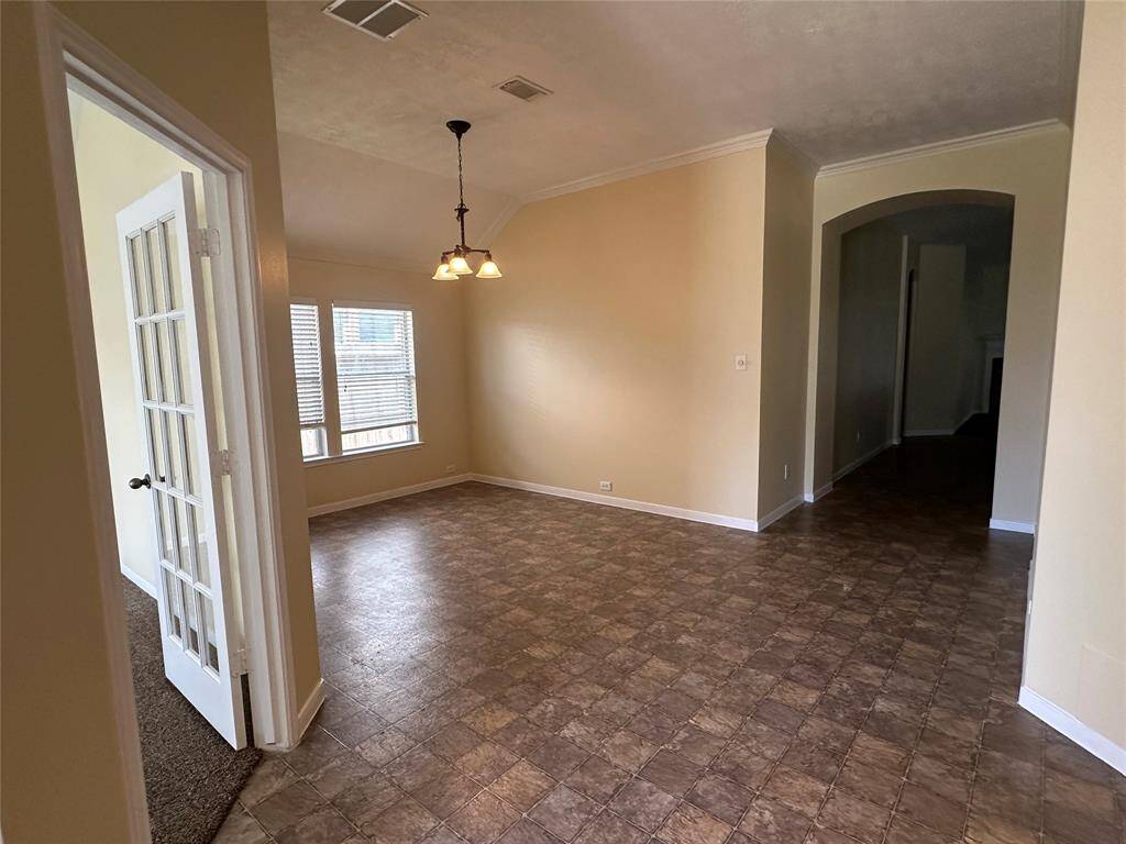 View of formal dining area upon entering home!