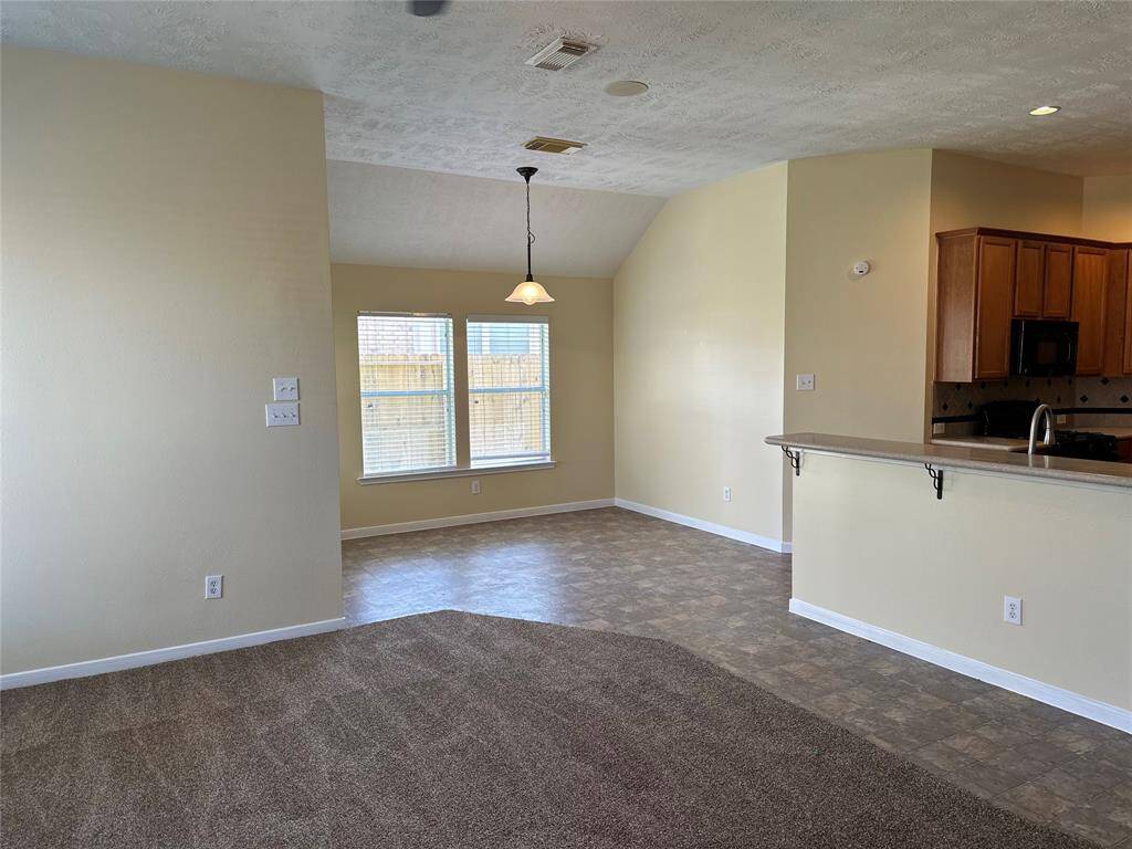 Overlooking the open floor plan and breakfast area!