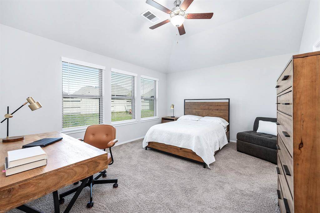 Plenty of room for a desk in this Primary Bedroom!