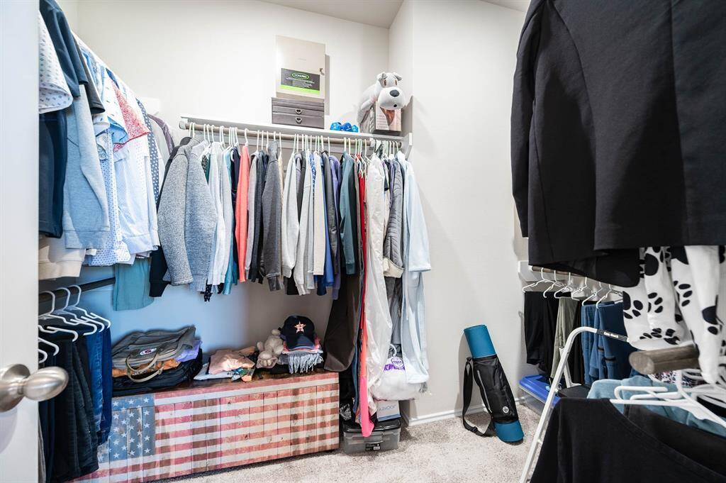 Walk-in Primary Bedroom Closet.