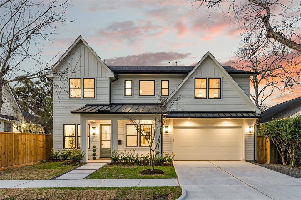 A modern masterpiece with a warm, inviting palette that seamlessly blends the indoors with the beauty of nature.