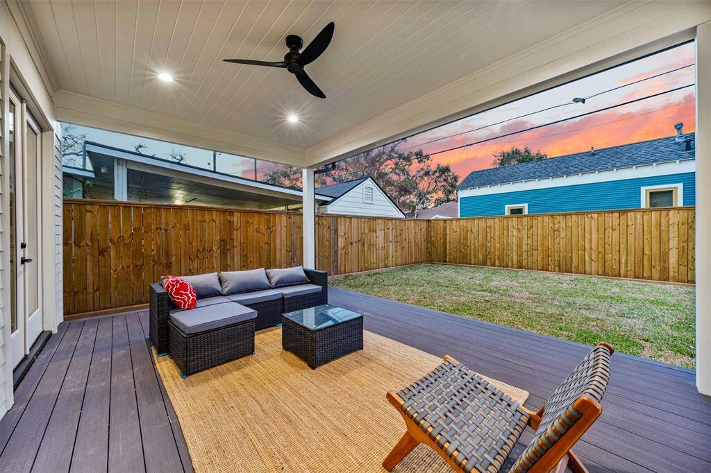 Look at this great backdeck and pool-worthy backyard.