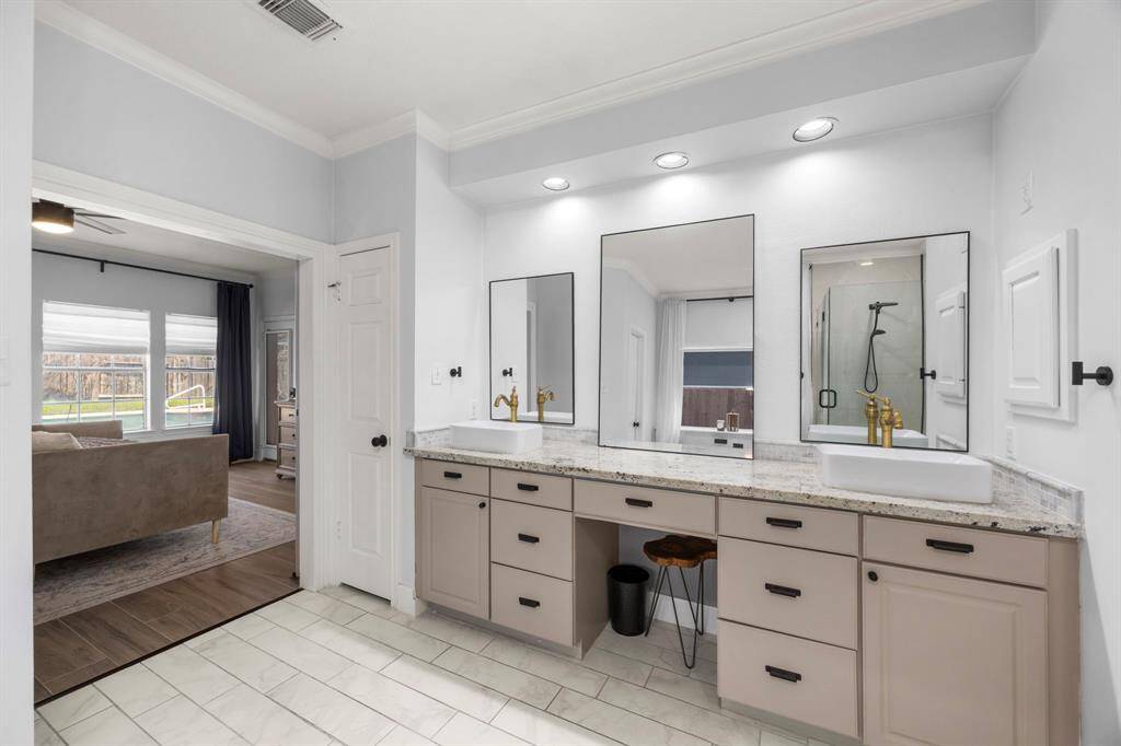 Travel upstairs to a gameroom, secondary bedrooms and secondary bathrooms.