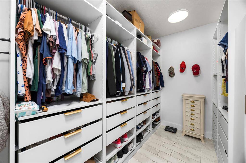 Huge Gameroom with plantation shutters and endless possibilities.