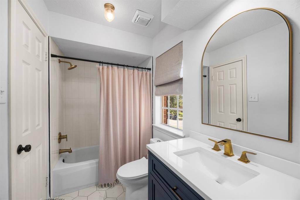 Bedroom 4 is on the opposite side of the second story with an ensuite bathroom.