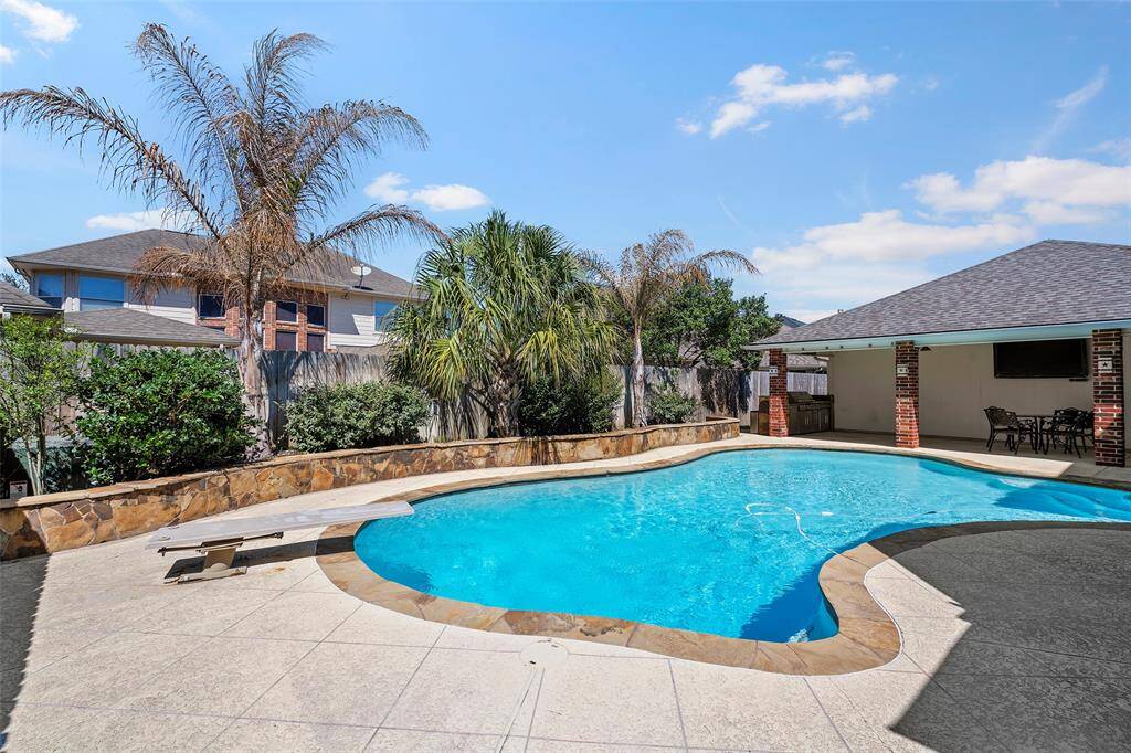 There is plenty of decking space to set the lounge chairs up and watch as people dive into the cool waters on a hot Texas summer day!