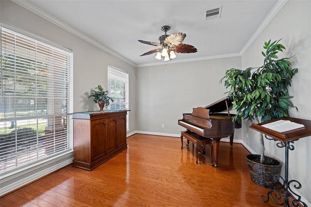 Flanked across from the formal dining room, is the formal living room!  This room has endless possibilities!  Imagine a library, home office, reading room, yoga studio or even downstairs play room!