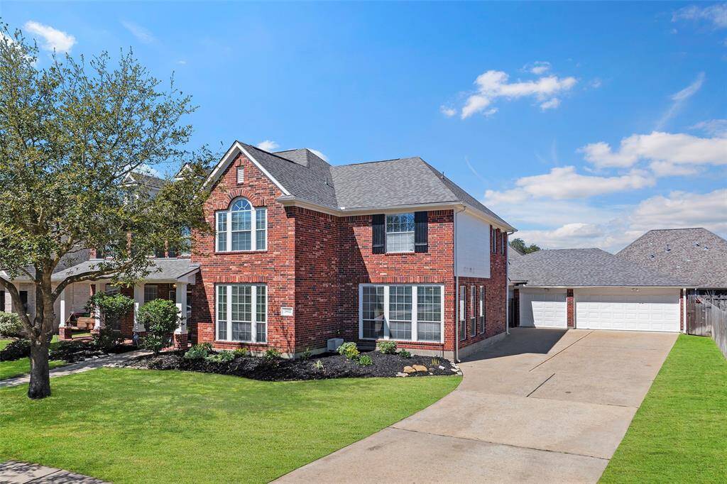 A long, expansive driveway leads up to a 3-wide tandem garage with rear extension, per seller, can house 6 small cars and provides plenty of parking and storage space! And added bonus of being insulated and diamond plated with A/C & Heat so you can tinker on those hot summer days too!