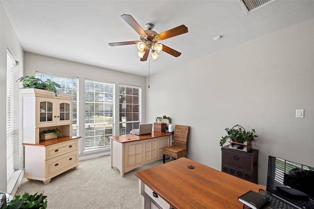 Tucked away, is this home office/study with a view!  It is a very light and bright space and could be converted to a delightful sunroom, mediation area or whatever your heart desires!